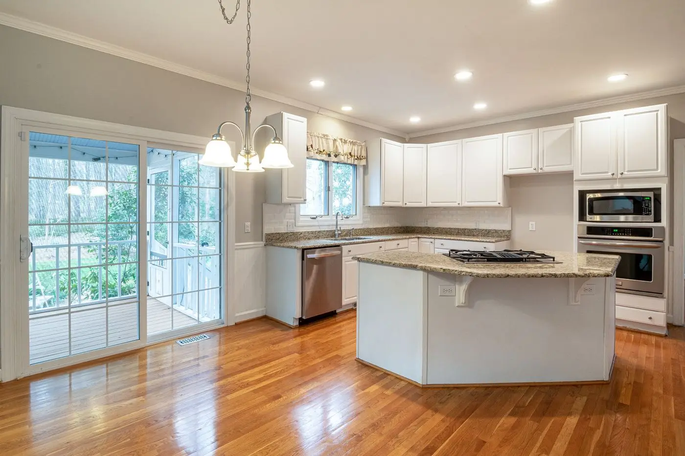 A bright residential kitchen with cabinets and counters. St. Petersburg.