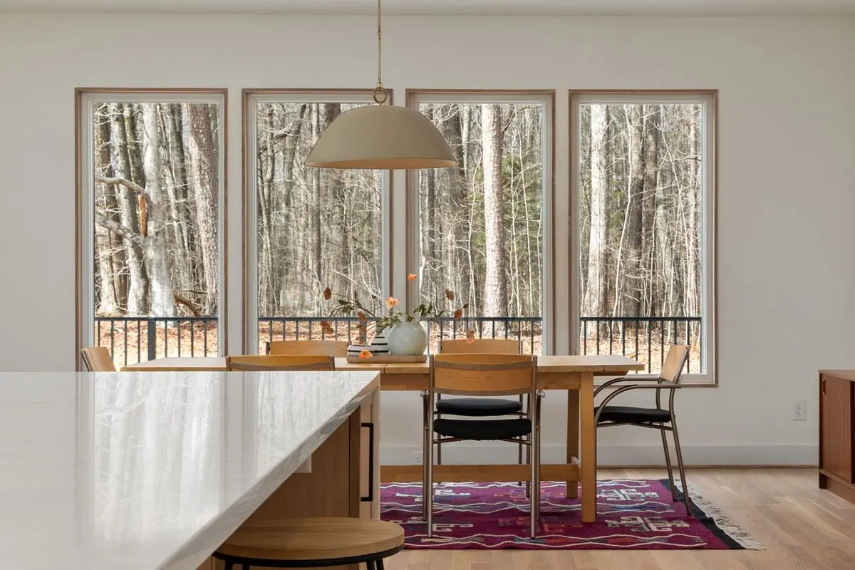 A bright residential kitchen with cabinets and counters. St. Petersburg.