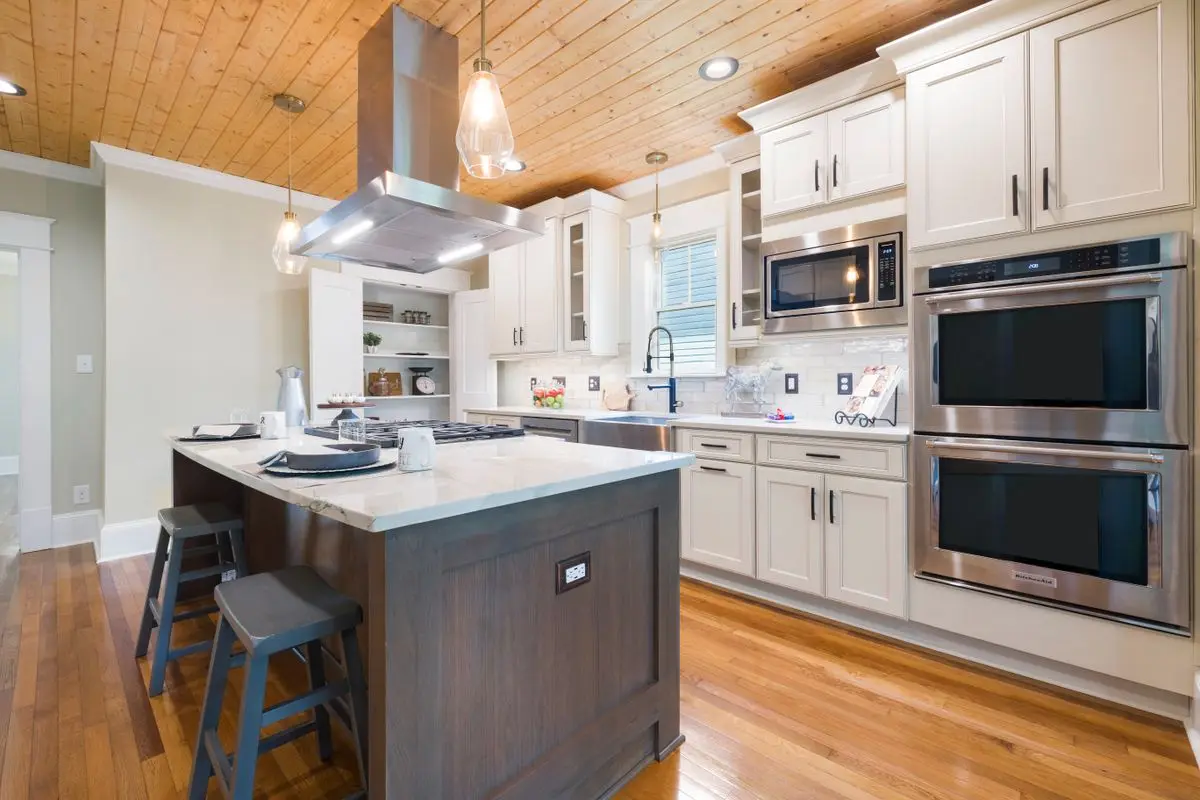 A bright residential kitchen with cabinets and counters. St. Petersburg.