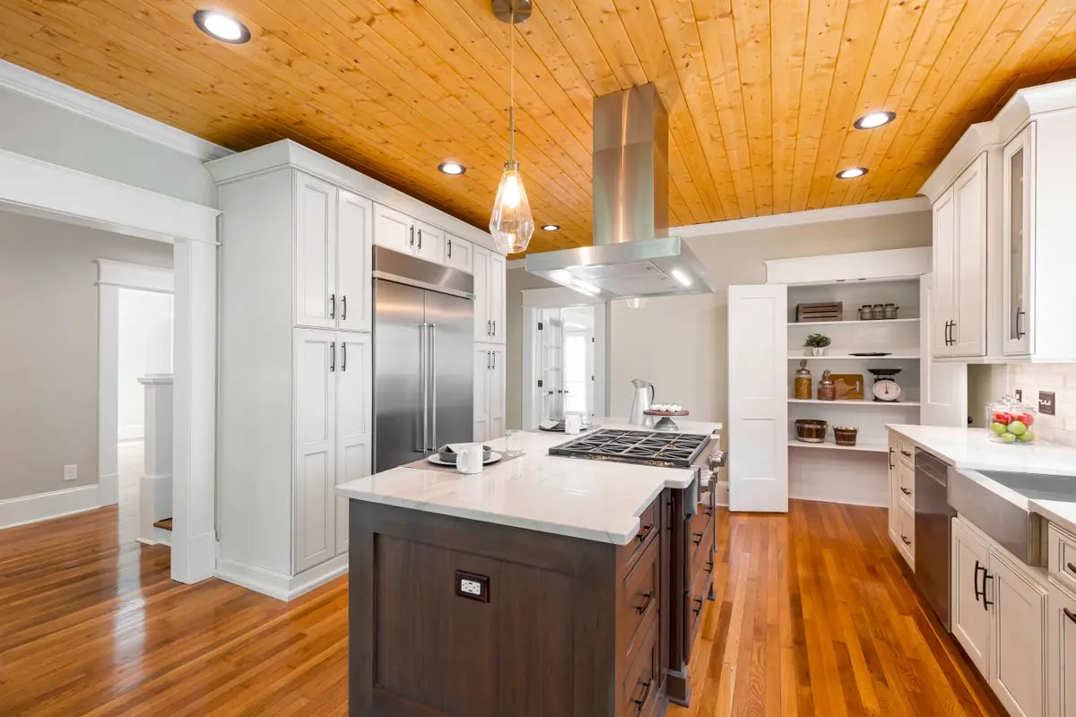 A bright residential kitchen with cabinets and counters. St. Petersburg.
