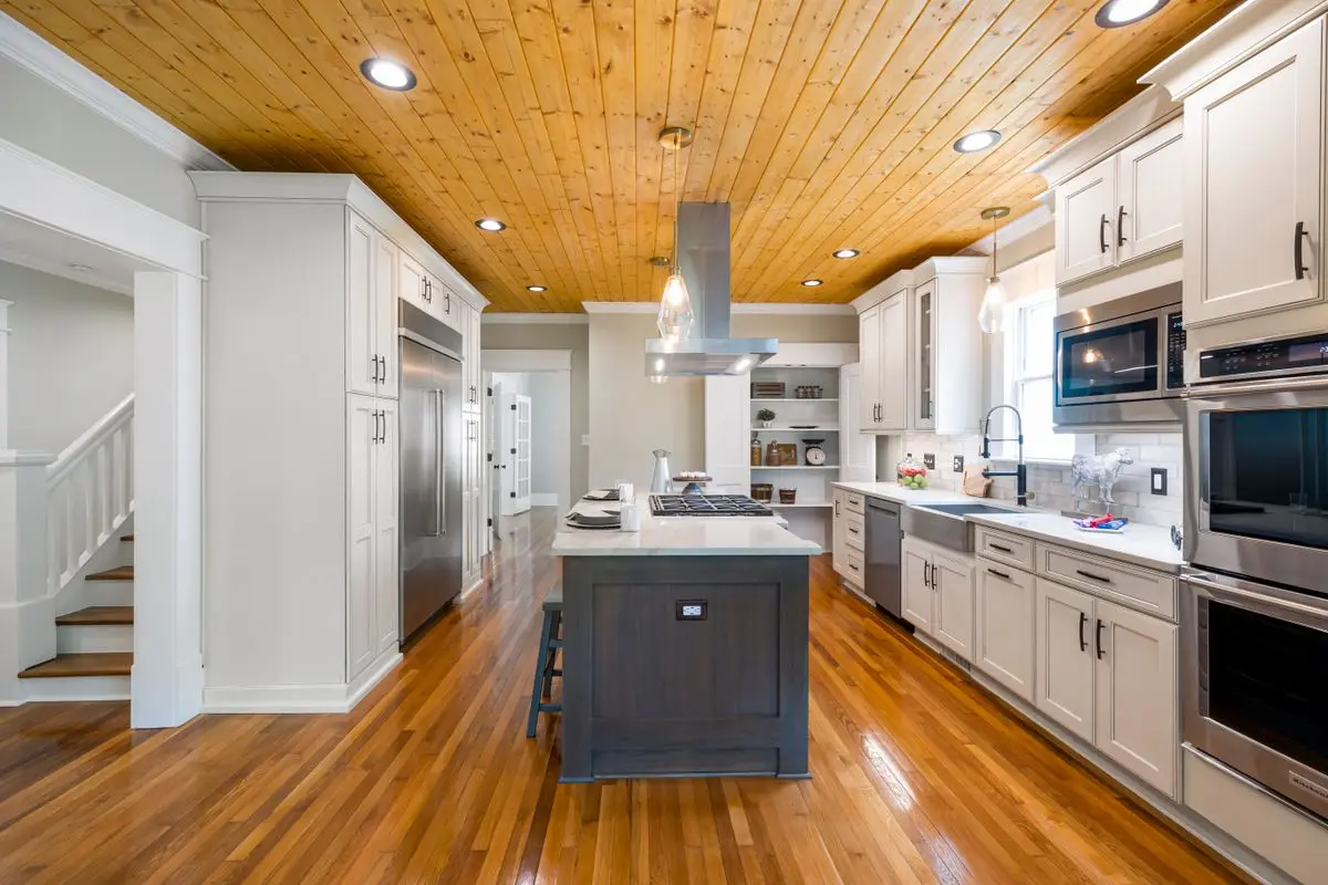 A bright residential kitchen with cabinets and counters. St. Petersburg.