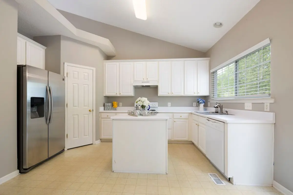 A bright residential kitchen with cabinets and counters. St. Petersburg.