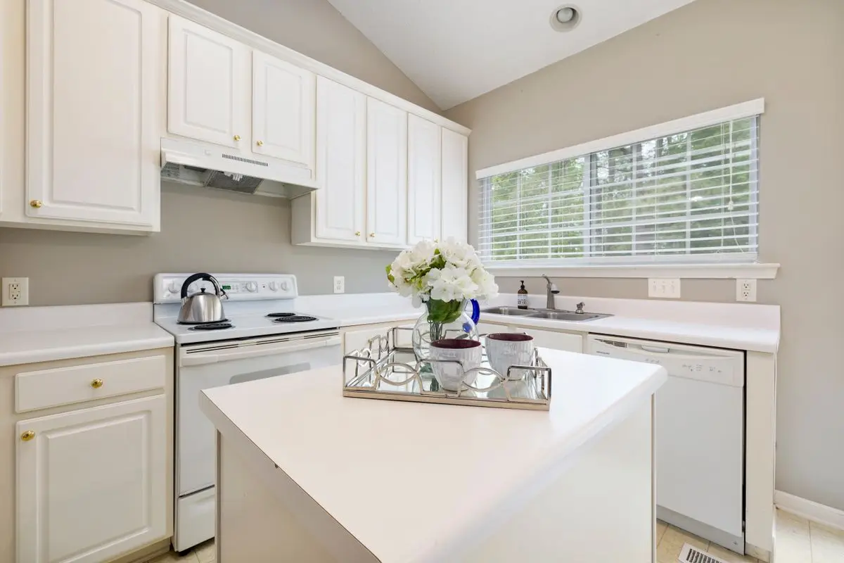 A bright residential kitchen with cabinets and counters. St. Petersburg.